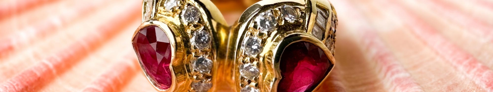 ruby ring set in 18 karat gold sold in an online auction at Hughes Auctions